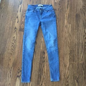 Medium wash blue Levi’s super skinny jeans